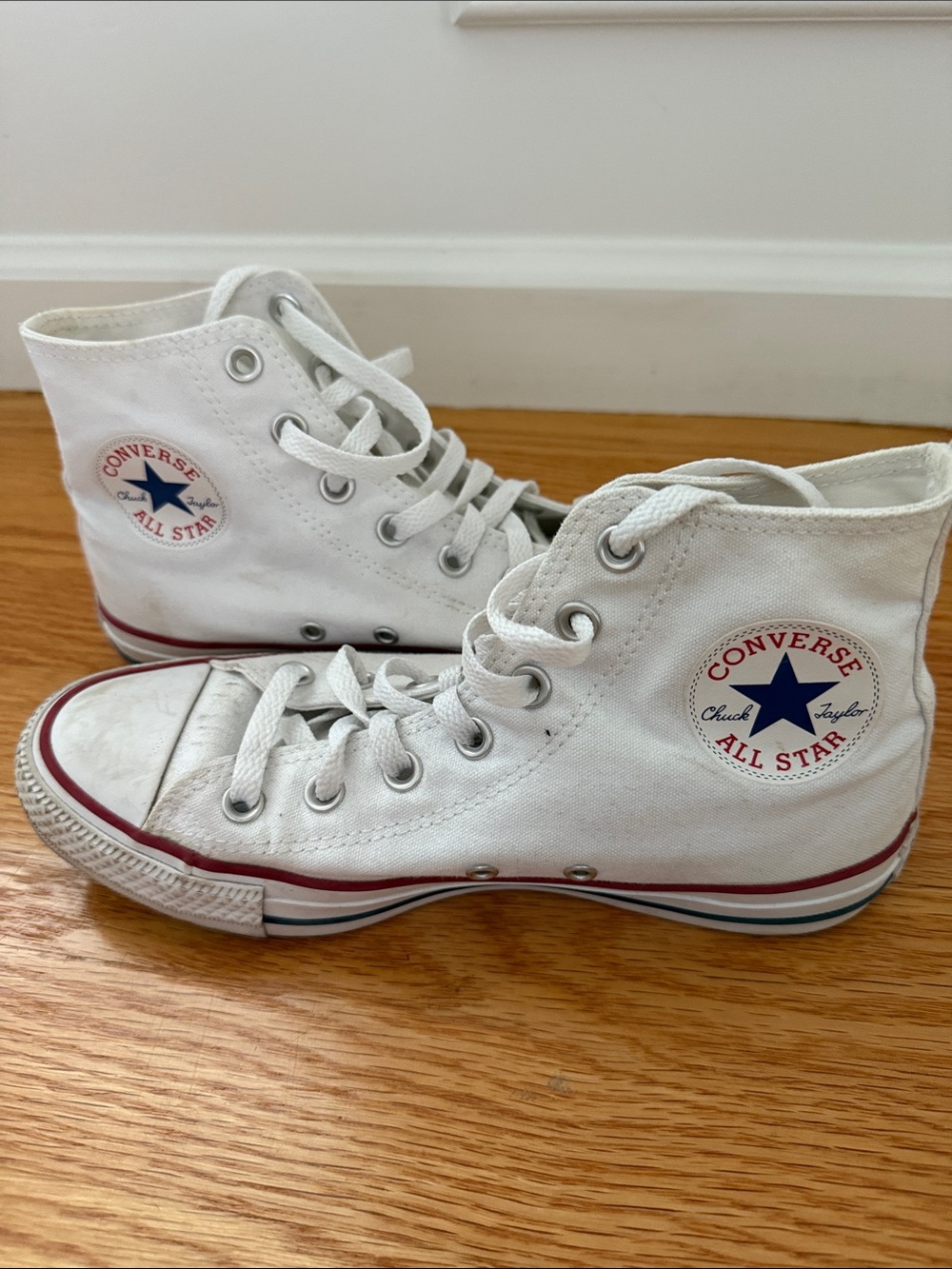 Converse White High Top Sneakers with Blue Star and Red Trim